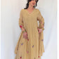 NOOR Beige Mul Chanderi Embroidered Anarkali  Suit Set Outfit Pose